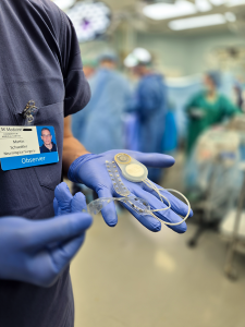 CTO Dr. Martin Schuettler holding the Brain Interchange System
